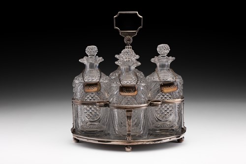 Lot 415 - A George III silver decanter oval stand with...