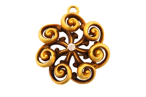 Lot 254 - A Victorian pinwheel pendant brooch with...