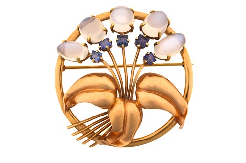 Lot 214 - A floral brooch set with moonstones and...