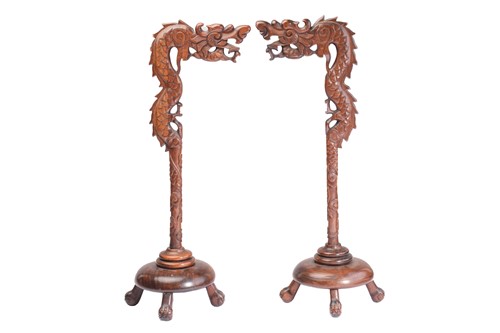 Lot 170 - A close pair of Chinese carved wood lantern...