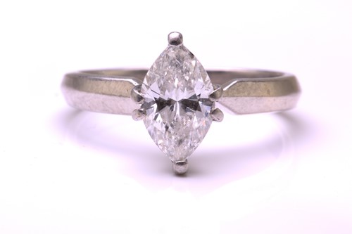 Lot 15 - A marquise diamond solitaire ring, comprises a...