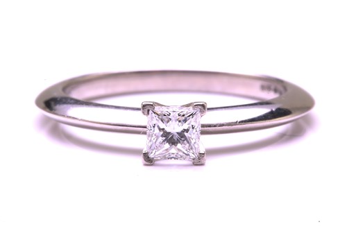 Lot 201 - Tiffany & Co. - a princess-cut diamond...