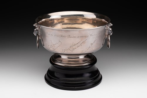 Lot 429 - A silver bowl with two lion mask and ring...