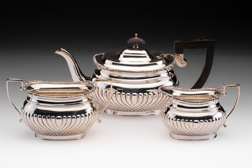 Lot 374 - A 20th century silver three piece tea service...