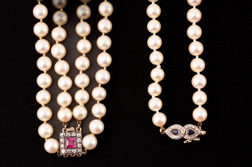 Lot 65 - Two cultured pearl necklaces with gem-set...