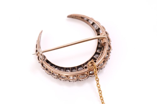 Lot 42 - A Victorian diamond crescent brooch, fully...