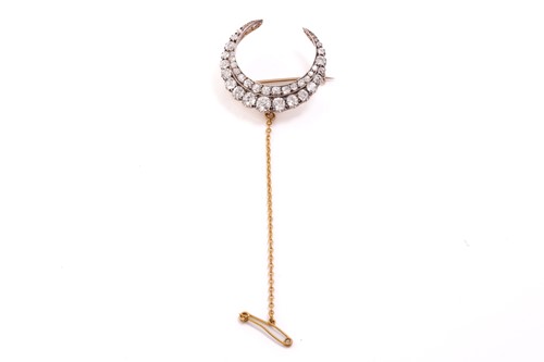 Lot 42 - A Victorian diamond crescent brooch, fully...