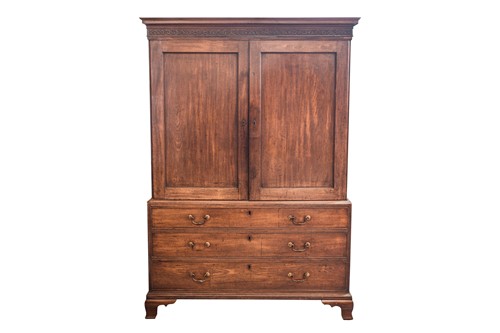 Lot 299 - A George III mahogany linen press, the...