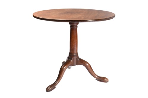 Lot 297 - A George III mahogany circular flip-top wine...