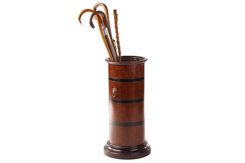 Lot 296 - An Edwardian-turned mahogany cylindrical stick...