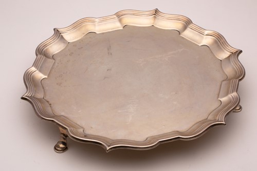 Lot 389 - A salver; circular with raised pie crust...