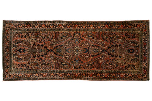 Lot 319 - An old Sarouk short runner with sprays of...