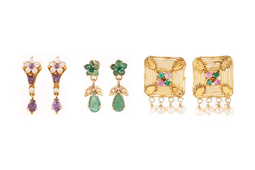 Lot 142 - Three pairs of gem-set earrings in high carat;...