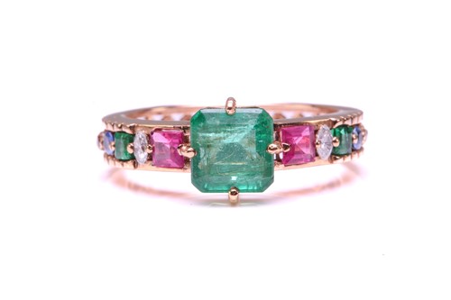 Lot 128 - A multi-gem set dress ring, centrally set with...