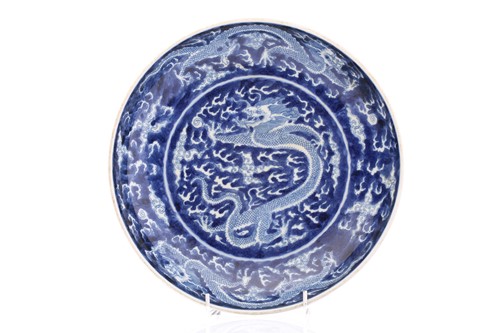Lot 220 - A Chinese porcel;ain blue & white dragon dish,...