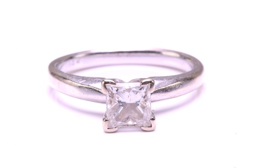 Lot 71 - A single-stone diamond ring. The princess cut...