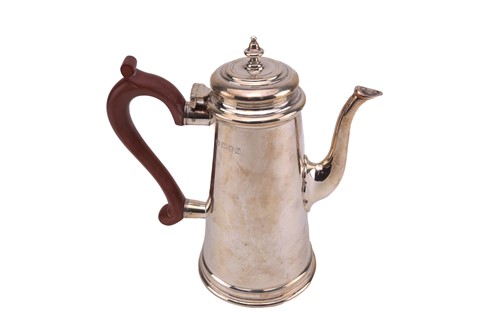 Lot 474 - A silver coffee pot in George II style, the...