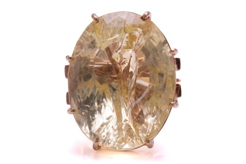 Lot 238 - A large citrine ring, featuring an oval...