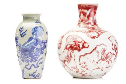 Lot 159 - A Chinese celadon porcelain vase,with relief...