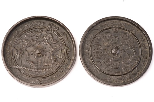 Lot 137 - A Chinese bronze mirror, Qing, 19th century,...
