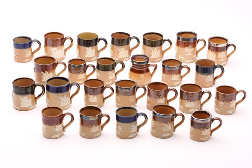 Lot 62 - Twenty five Doulton stoneware miniature...