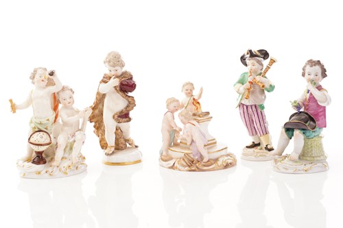 Lot 441 - Five Meissen figures, including a group of...