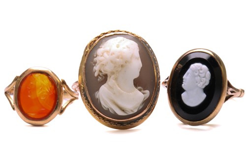 Lot 166 - Two cameo rings and an intaglio ring; to...