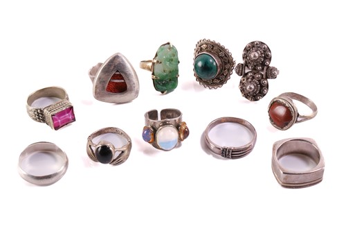 Lot 126 - A collection of eleven rings, one yellow metal...