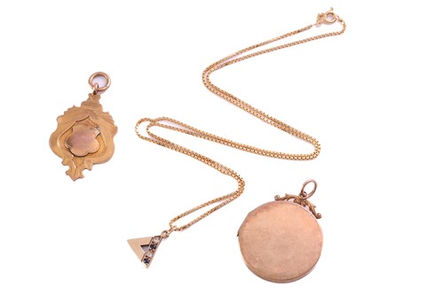 Lot 269 - A gem-set pendant on chain, a pendant and a...