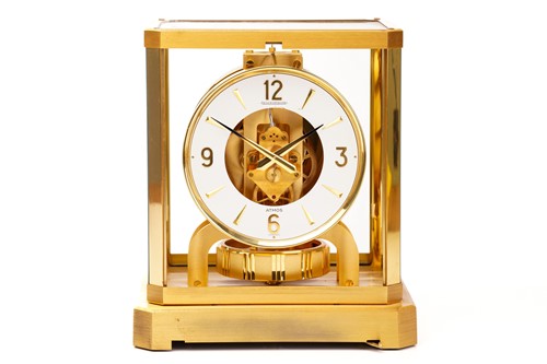 Lot 300 - A Jaeger LeCoultre brushed brass Atmos clock,...