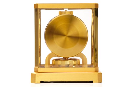 Lot 300 - A Jaeger LeCoultre brushed brass Atmos clock,...