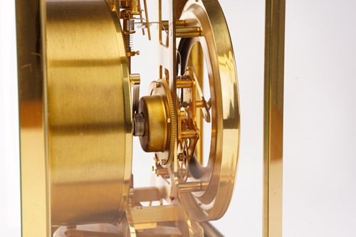 Lot 300 - A Jaeger LeCoultre brushed brass Atmos clock,...