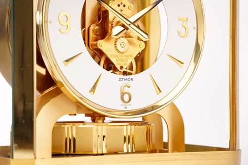 Lot 300 - A Jaeger LeCoultre brushed brass Atmos clock,...