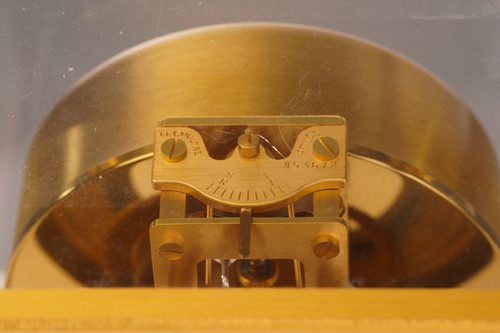 Lot 300 - A Jaeger LeCoultre brushed brass Atmos clock,...