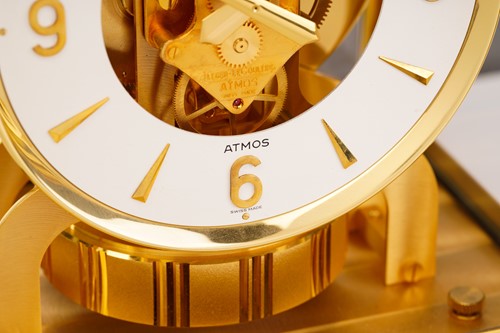 Lot 300 - A Jaeger LeCoultre brushed brass Atmos clock,...