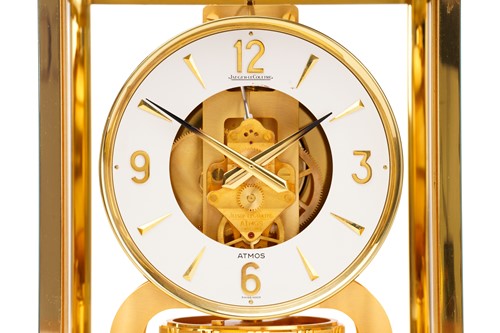 Lot 300 - A Jaeger LeCoultre brushed brass Atmos clock,...