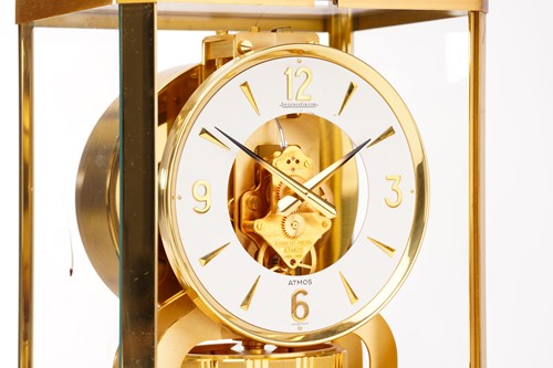 Lot 300 - A Jaeger LeCoultre brushed brass Atmos clock,...
