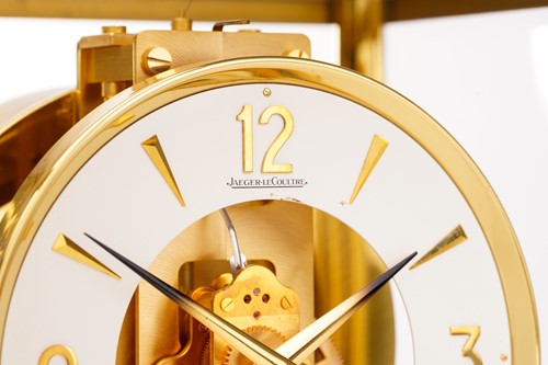 Lot 300 - A Jaeger LeCoultre brushed brass Atmos clock,...