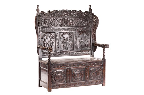 Lot 295 - A 19th-century "Jacobethan" box settle with...
