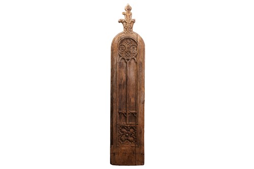 Lot 159 - A carved oak choir or pew end, with a roundel...