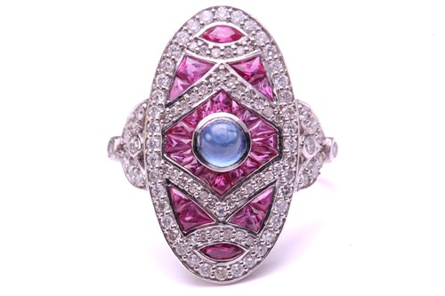 Lot 57 - An art deco style oval panel ring set with a...