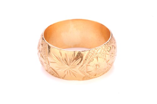 Lot 225 - A 22ct yellow gold ring, the thick D-section...