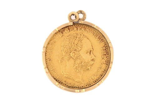 Lot 343 - An Austrian 1 Ducat coin in a yellow metal...