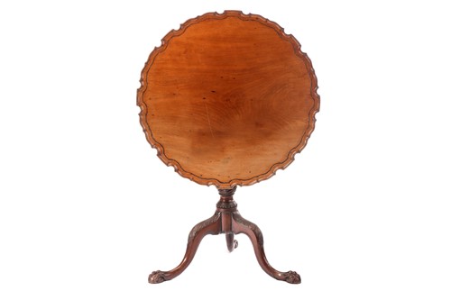 Lot 286 - A George III mahogany piecrust edged circular...