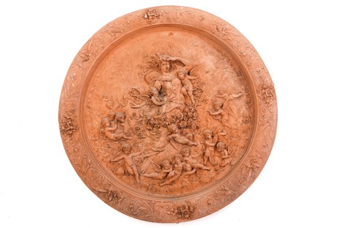 Lot 428 - A large terracotta relief garden plaque,...