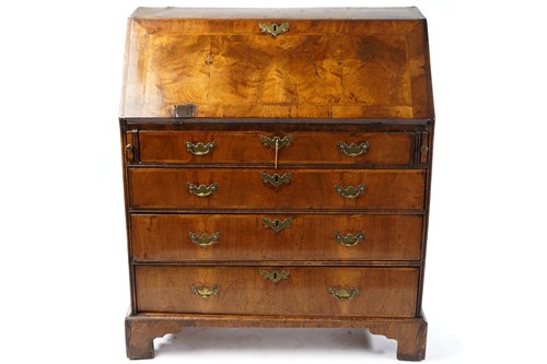 Lot 250 - A George II walnut fall front writing bureau...