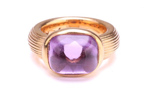 Lot 96 - An amethyst dress ring in 18ct yellow gold,...