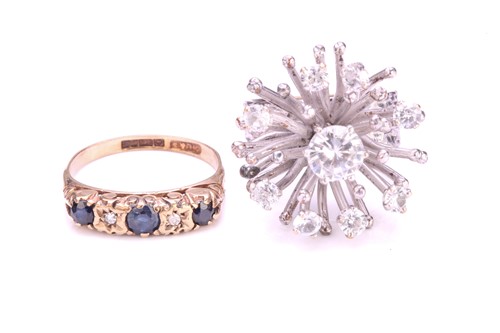 Lot 213 - A three-stone half hoop ring in 9ct gold, and...