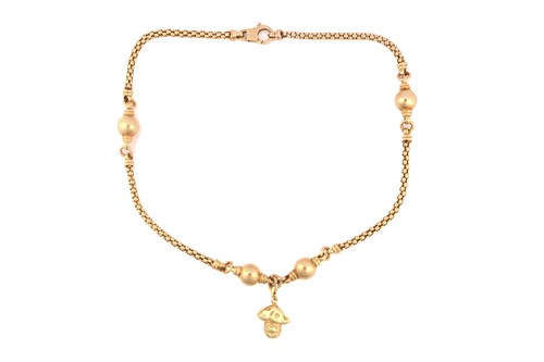 Lot 179 - A mushroom charm on a necklace, with popcorn...