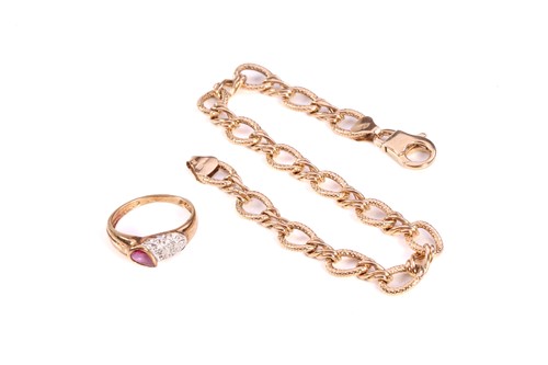 Lot 152 - A fancy link bracelet and a ring in 9ct yellow...